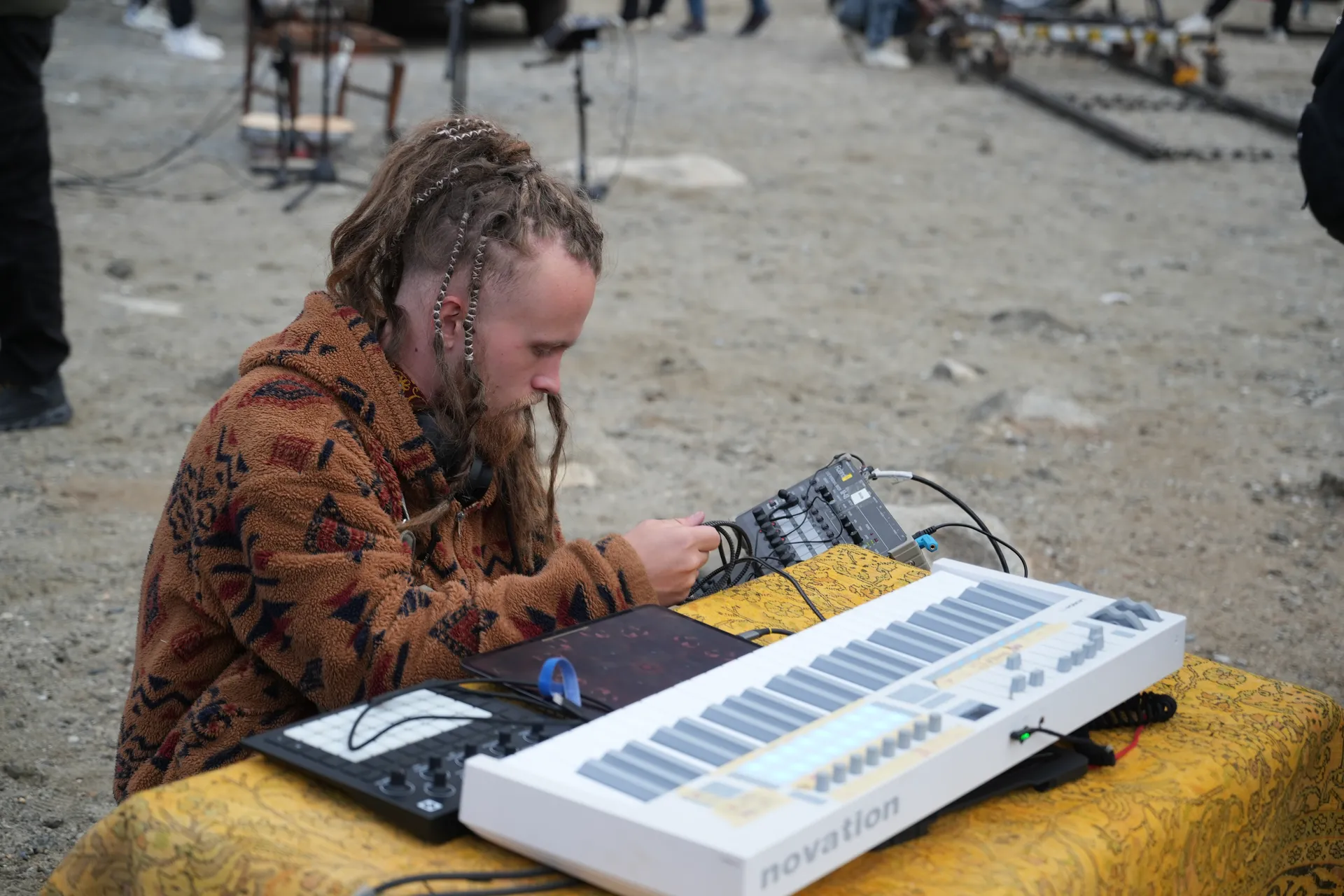 Gray Contrast setting up synths for an open-air recording in Passu, Hunza, Pakistan